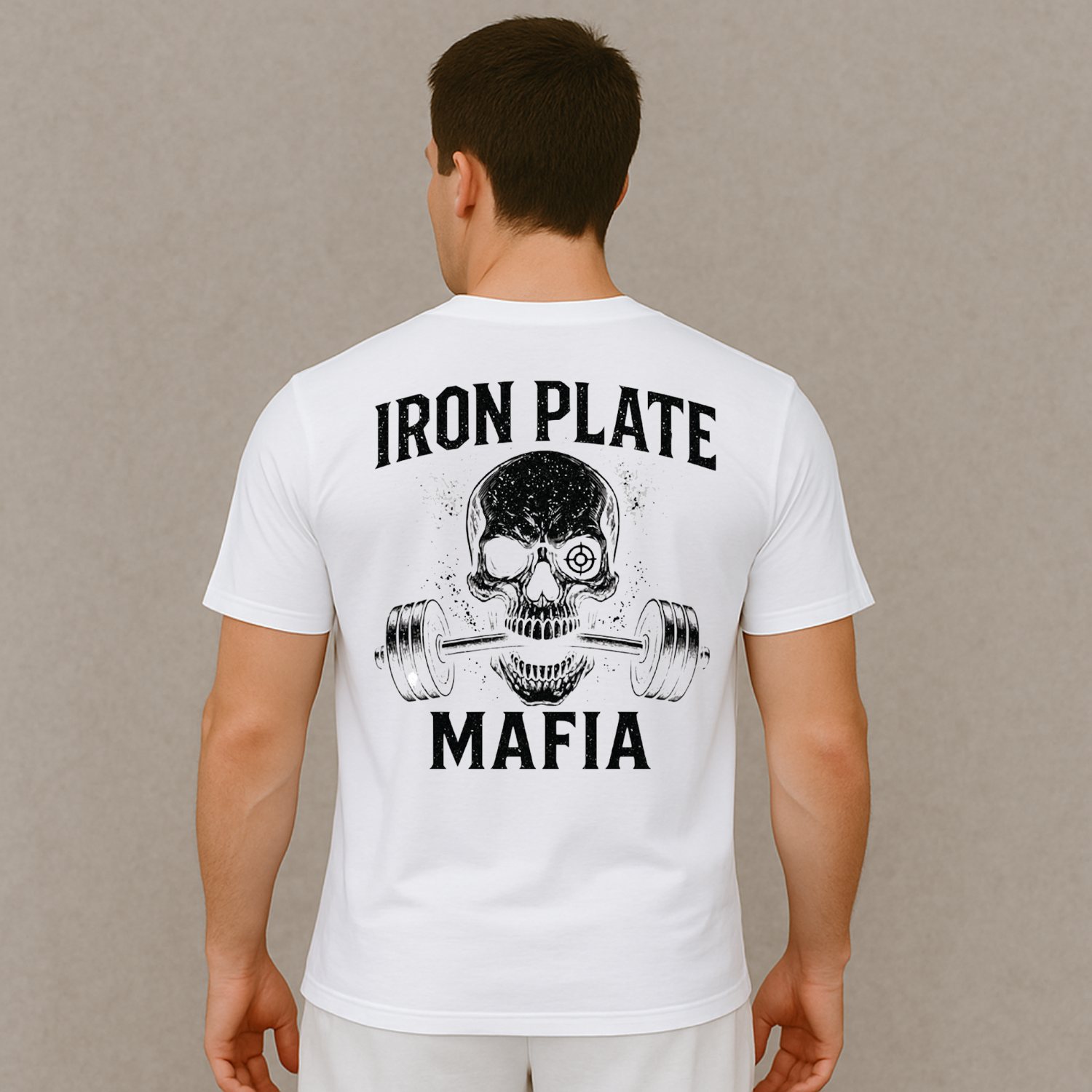 White gym shirt with barbell skull design on model – Iron Plate Mafia